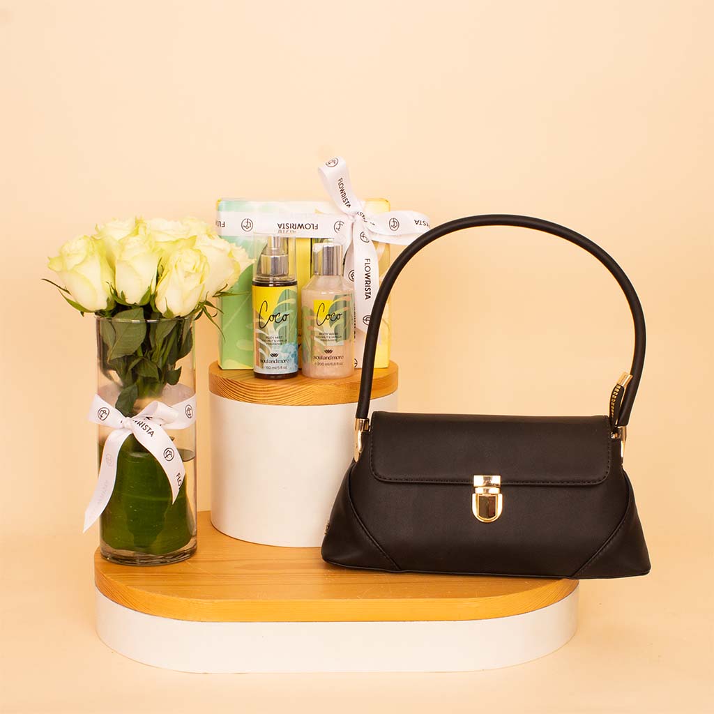 Flowrista Online Flowers Shop حقيبة عالمكي أرفين السوداء مع مجموعة سول آند مور كوكو مع مزهرية ورود بيضاء